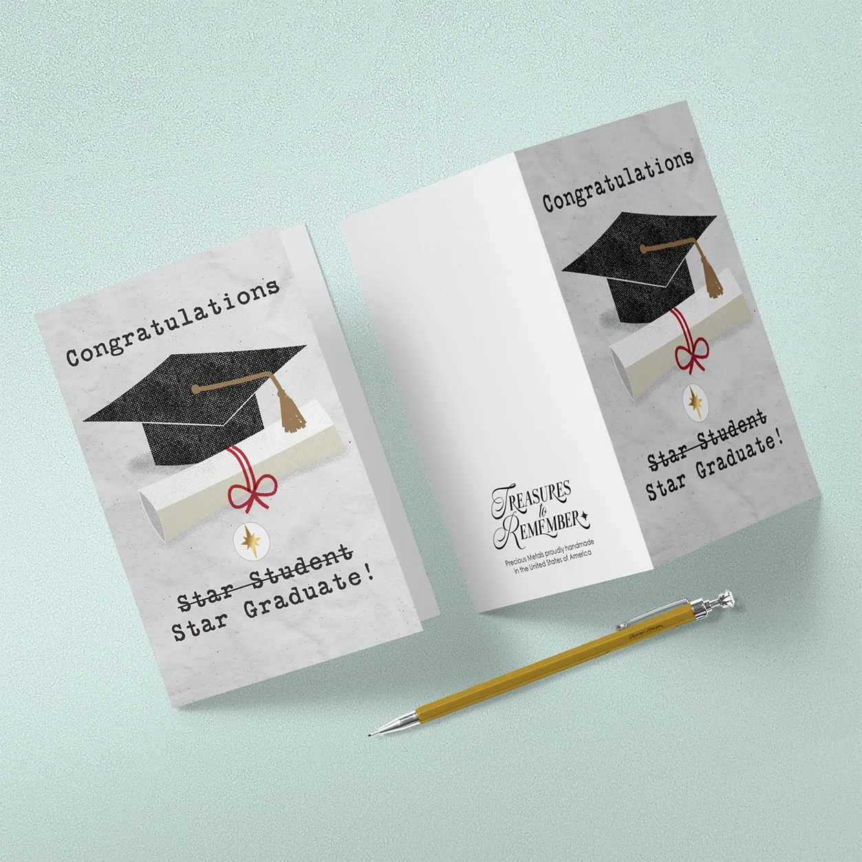Graduation card reading Star Student struck through and corrected to Star Graduate, above a mortarboard and ribboned diploma