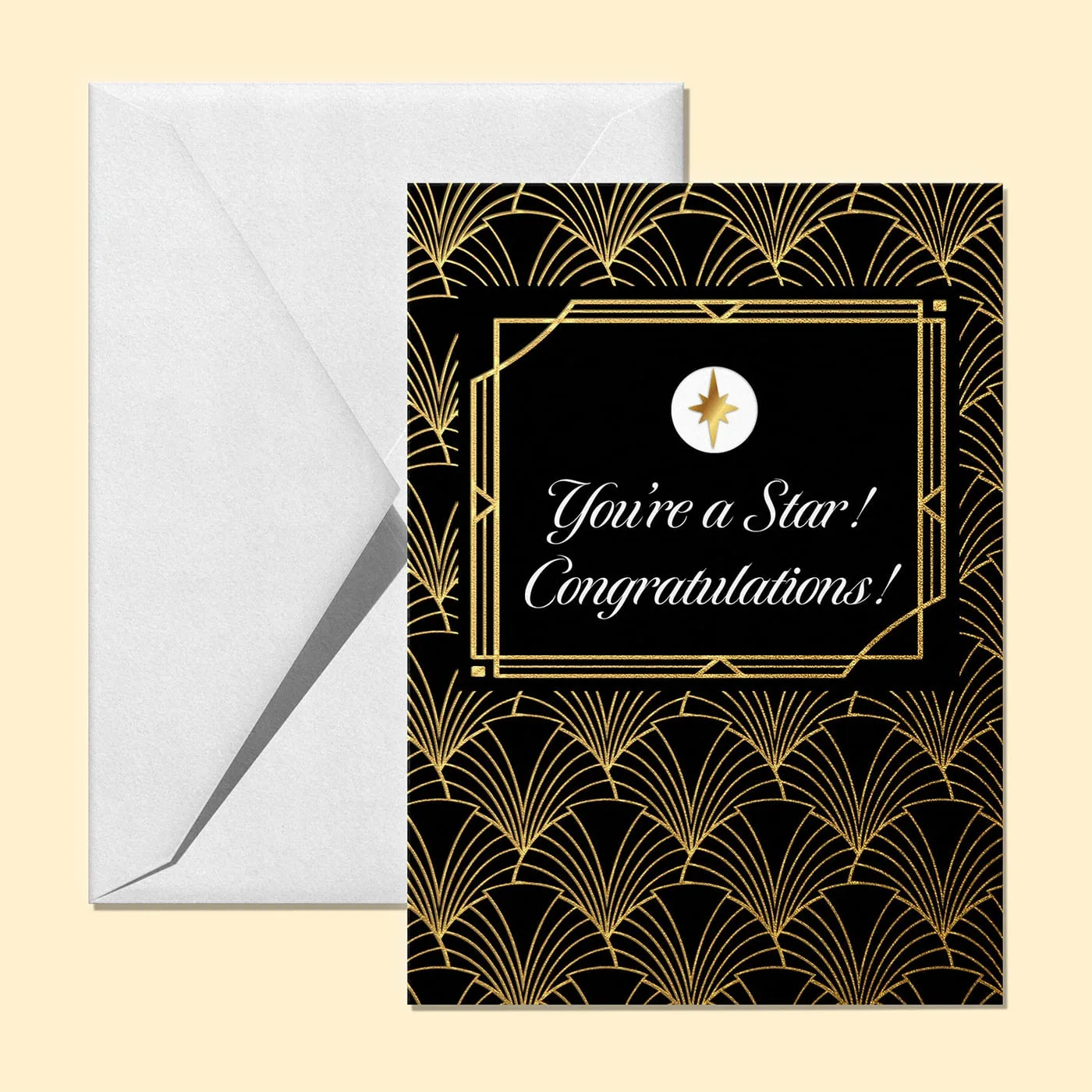 Art deco congratulations card in black and gold fan pattern with a gold starburst set into the frame