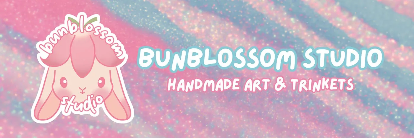 Bunblossom Studio banner reading Handmade Art and Trinkets over an iridescent pink and blue glitter wash