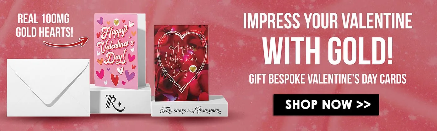 Valentine's web banner promoting real 100mg gold hearts, cards on branded plinths beside a shop now button